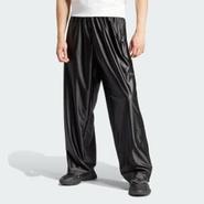 Oferta de Pantalón Deportivos Firebird Oversized por $1427 en Adidas