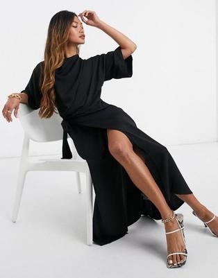 Oferta de ASOS DESIGN cowl neck midi dress with wrap skirt in black por $28 en ASOS