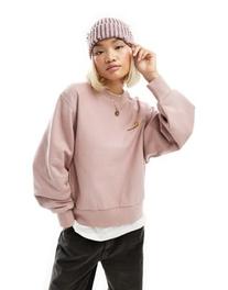 Oferta de Carhartt WIP american script sweatshirt in pink por $90 en ASOS