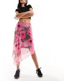 Oferta de ASOS DESIGN draped maxi skirt in leopard floral print por $24 en ASOS