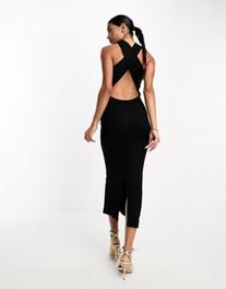 Oferta de ASOS DESIGN high neck minimal halter midi dress with cross back in black por $14 en ASOS