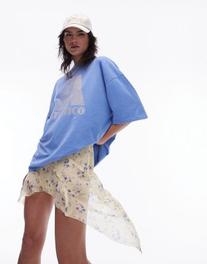 Oferta de Topshop ditsy floral seamed asymmetric skirt in buttermilk por $47.99 en ASOS