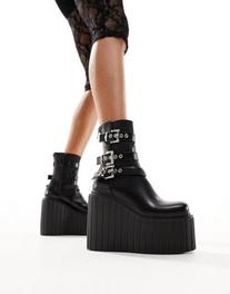 Oferta de Lamoda Good Intiative buckle wedge ankle boots in black por $98.99 en ASOS