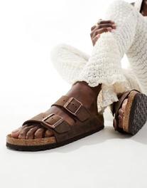 Oferta de Birkenstock Arizona sandals in habana oiled leather por $137.99 en ASOS
