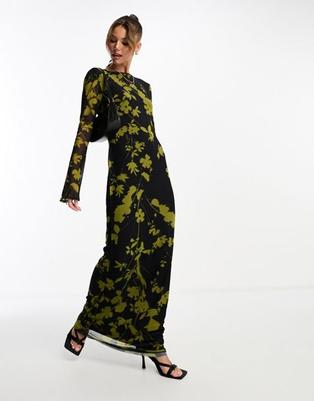 Oferta de ASOS DESIGN low back floral mesh maxi dress with angel sleeves in green and black print por $32 en ASOS