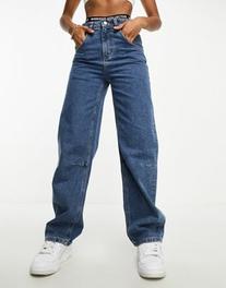 Oferta de ASOS Weekend Collective baggy fit jeans in mid blue wash por $38 en ASOS