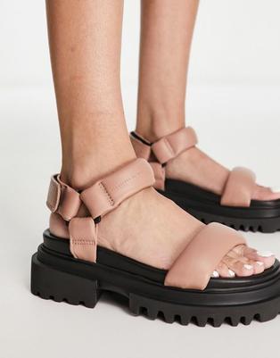 Oferta de AllSaints Helium leather sandals in pink por $149.25 en ASOS
