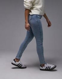 Oferta de Topshop Hourglass high rise Jamie jeans in bleach por $45 en ASOS