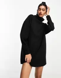 Oferta de ASOS DESIGN supersoft volume sleeve roll neck mini jumper dress in black por $22.5 en ASOS