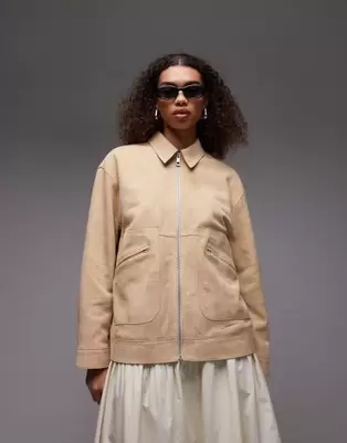 Oferta de Topshop premium suede jacket with seam detail in buttermilk por $432 en ASOS