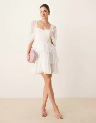 Oferta de Lace & Beads off shoulder corset tulle mini dress in ivory por $72 en ASOS