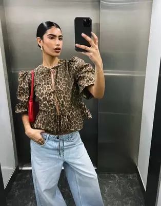 Oferta de ASOS DESIGN cotton poplin peplum tie shirt top in leopard print por $7.5 en ASOS