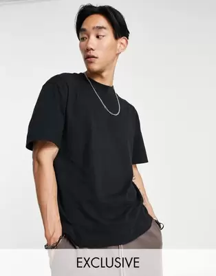 Oferta de COLLUSION t-shirt in black por $6.99 en ASOS