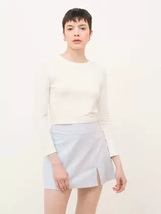 Oferta de Playera Brillosa Blanca por $199 en Cuidado con el Perro