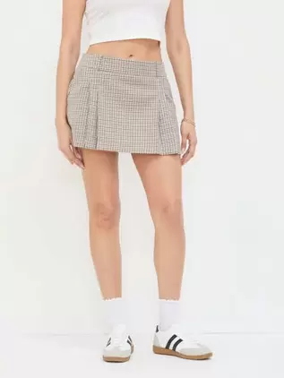 Oferta de Falda Cuadros Café por $299 en Cuidado con el Perro