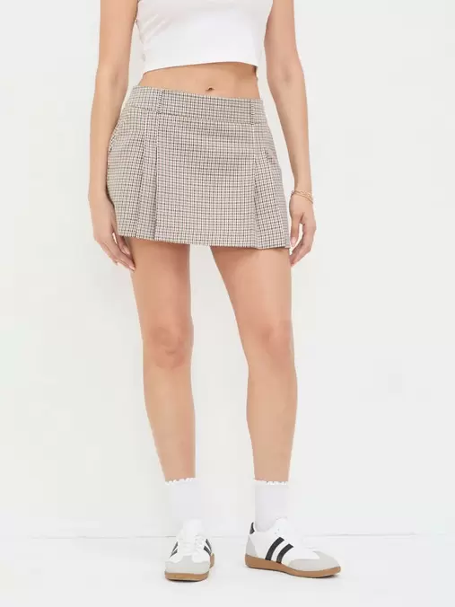 Oferta de Falda Cuadros Café por $299 en Cuidado con el Perro