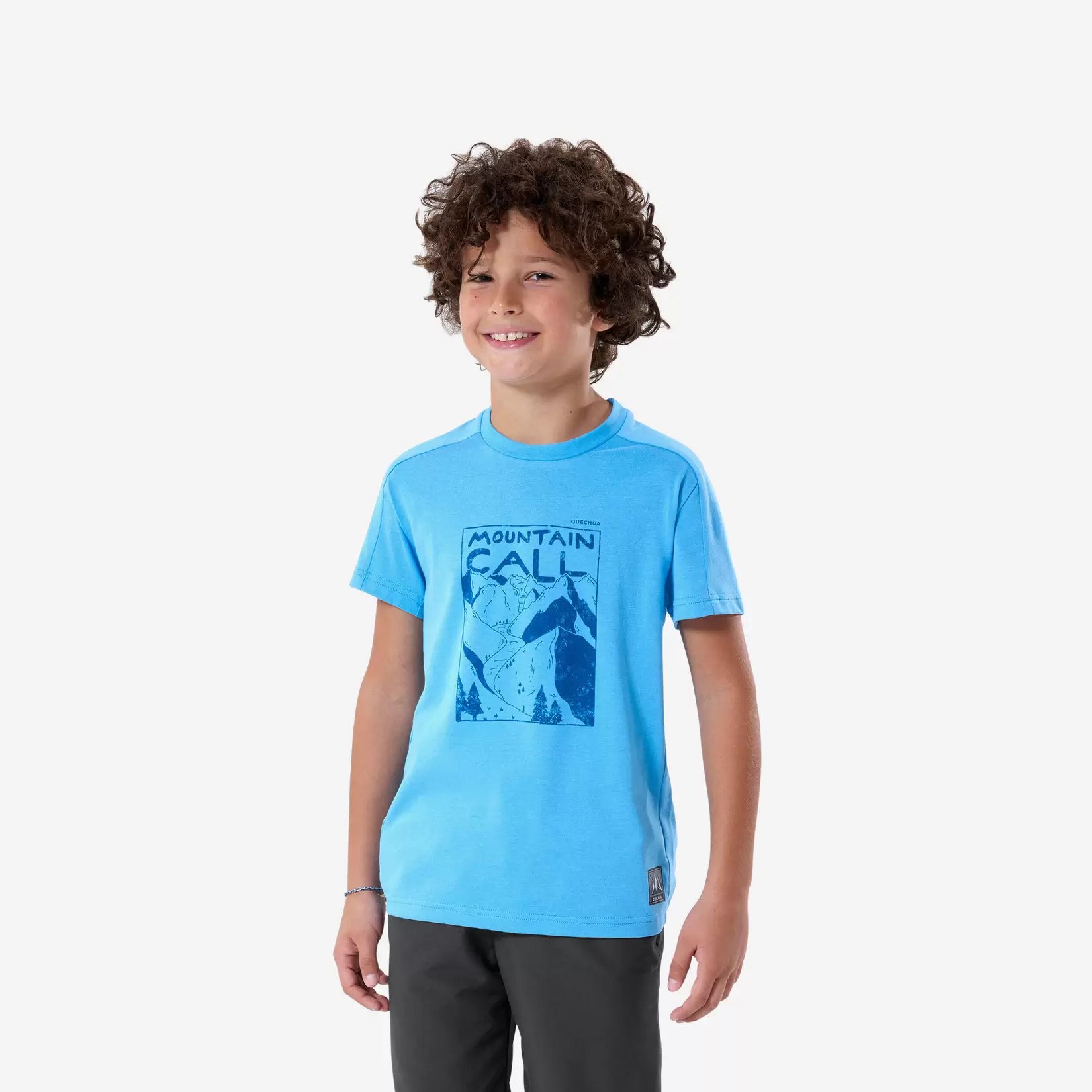 Oferta de Playera de senderismo azul para niños de 7 a 15 años MH100 por $160 en Decathlon