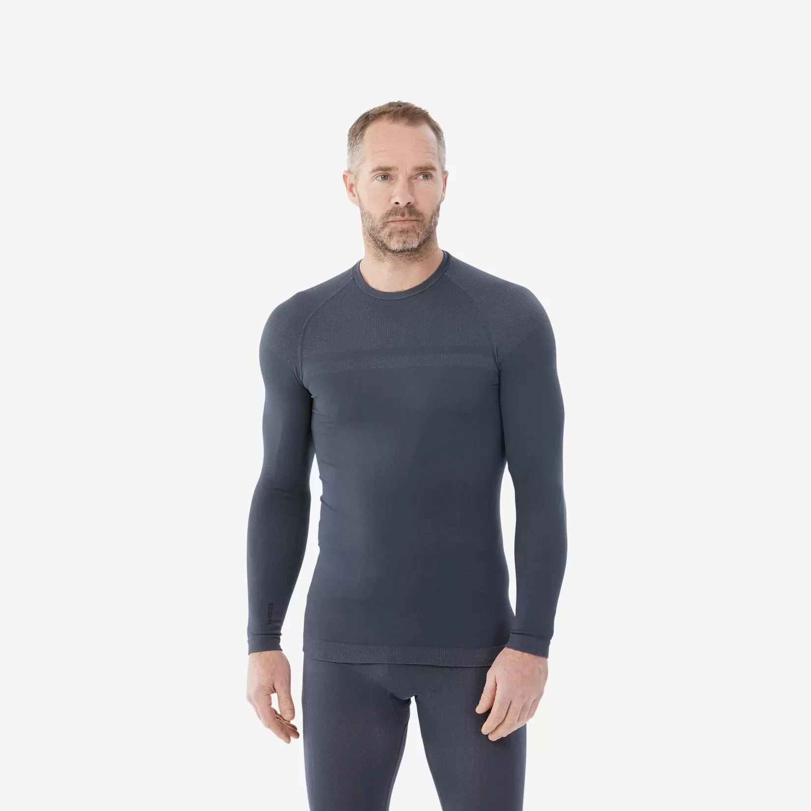 Oferta de Playera térmica de esquí de lana merina cálida gris para hombre BL100 por $450 en Decathlon