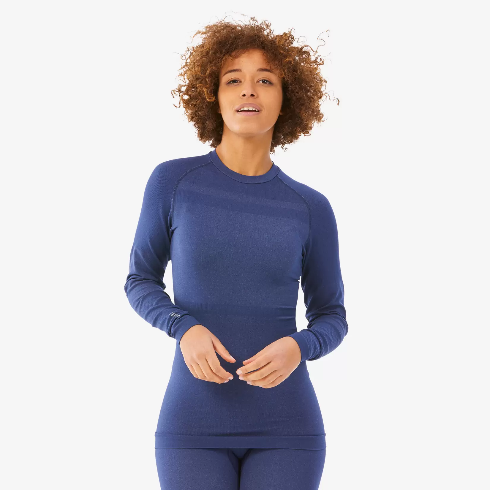 Oferta de Playera de esquí térmica y transpirable sin costuras azul para mujer BL500 por $450 en Decathlon