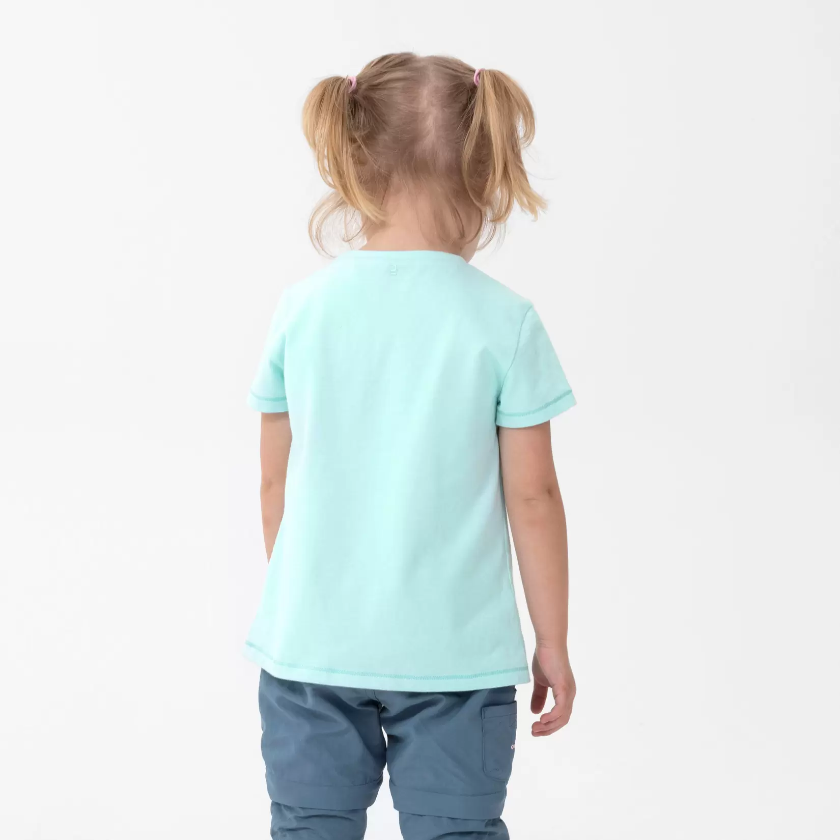 Oferta de Playera de senderismo turquesa fosforescente para niños 2 a 6 años MH100 por $150 en Decathlon