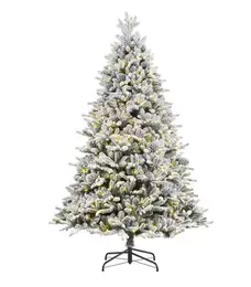 Oferta de Árbol de Navidad Ashville Semi Nevado de 2.29 mts con luz por $16099.3 en El Palacio de Hierro