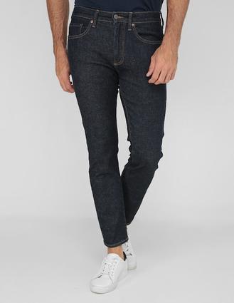 Oferta de Jeans skinny lavado obscuro para hombre por $599.6 en GAP