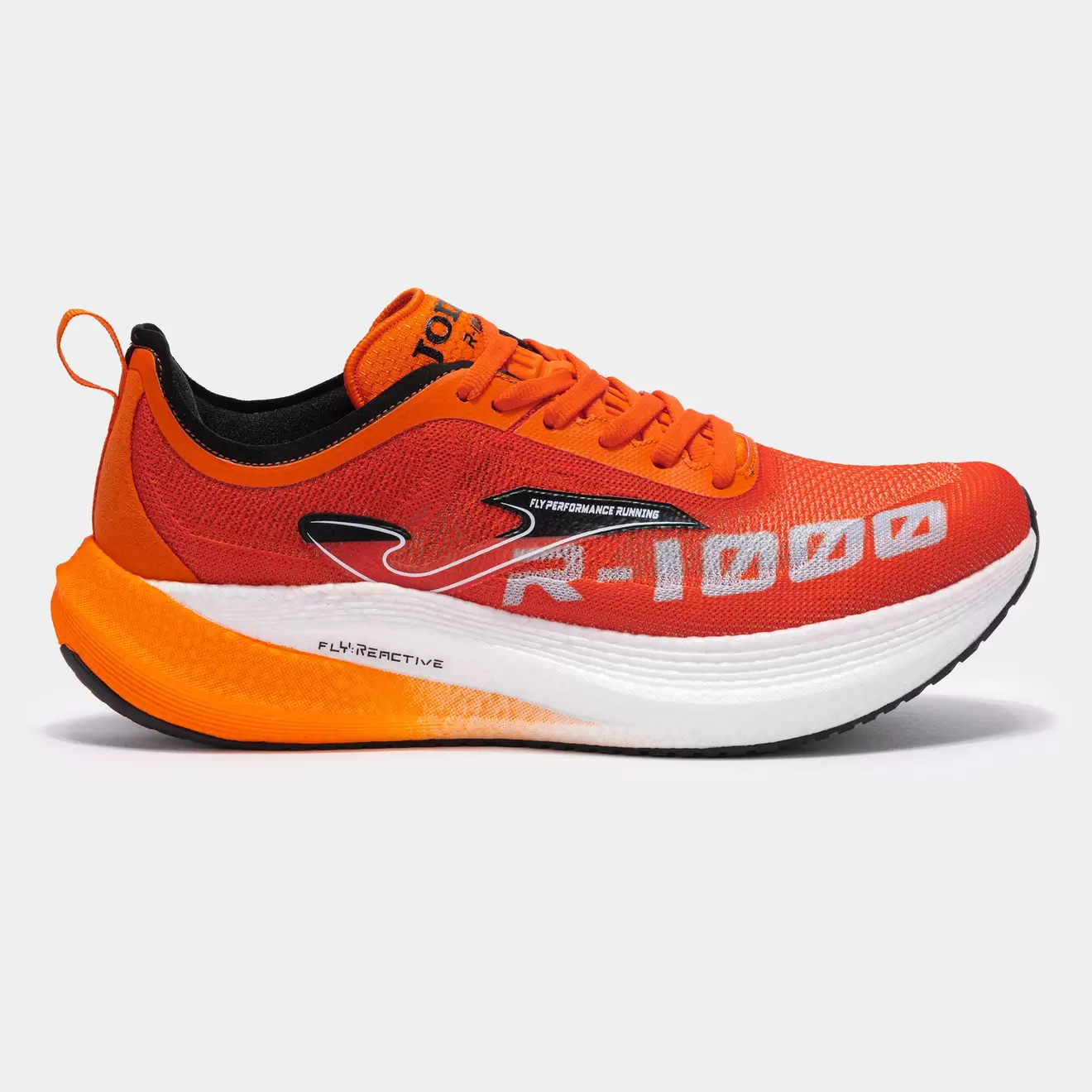 Oferta de Zapatillas running R1000 unisex naranja por $2999 en Joma