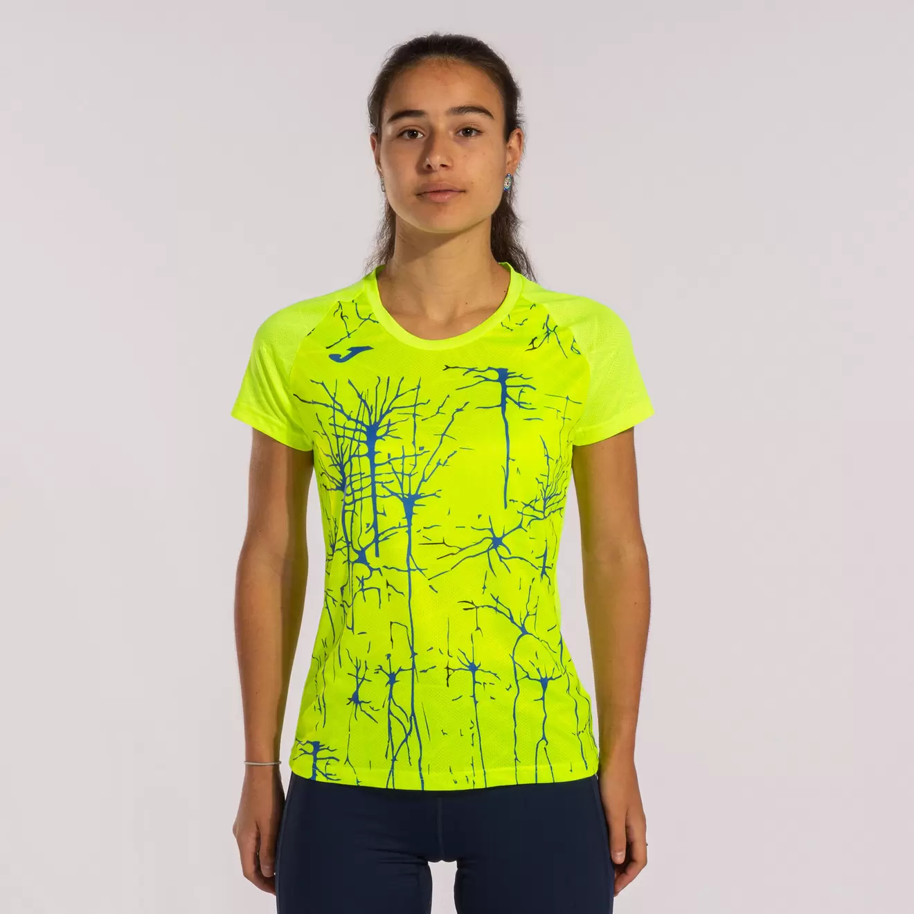 Oferta de Camiseta manga corta mujer Elite IX amarillo flúor por $460 en Joma