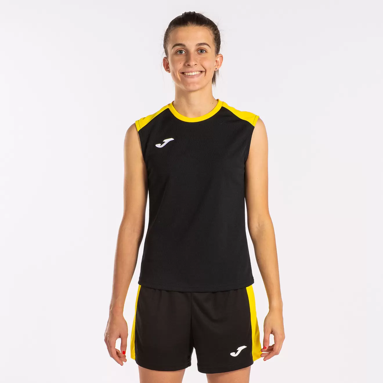 Oferta de Camiseta tirantes mujer Eco Championship negro amarillo por $499 en Joma