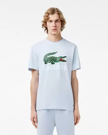 Oferta de Playera de punto de algodón con estampado de la marca por $1253 en Lacoste