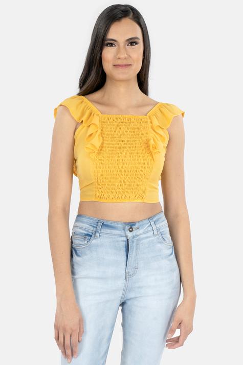 Oferta de Blusa sin mangas con olanes por $69 en Santory