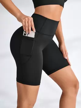 Oferta de SHEIN Sport Studio Shorts deportivos con bolsillo lateral para teléfono, shorts elásticos por $95.9 en SHEIN