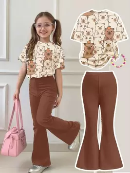 Oferta de SHEIN Set de 2 piezas de camiseta de manga corta holgada y pantalones acampanados con estampado de animal de dibujos animados de capibara lindo para niñas preadolescentes, para verano por $234.75 en SHEIN
