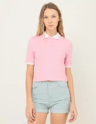 Oferta de Playera tipo polo Mossimo para mujer por $129 en Suburbia