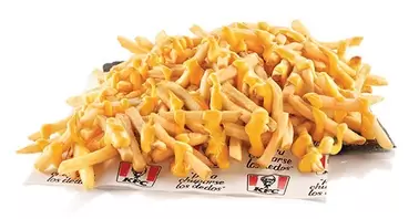 Oferta de CHEESY FRIES FAMILIARES por $125 en KFC