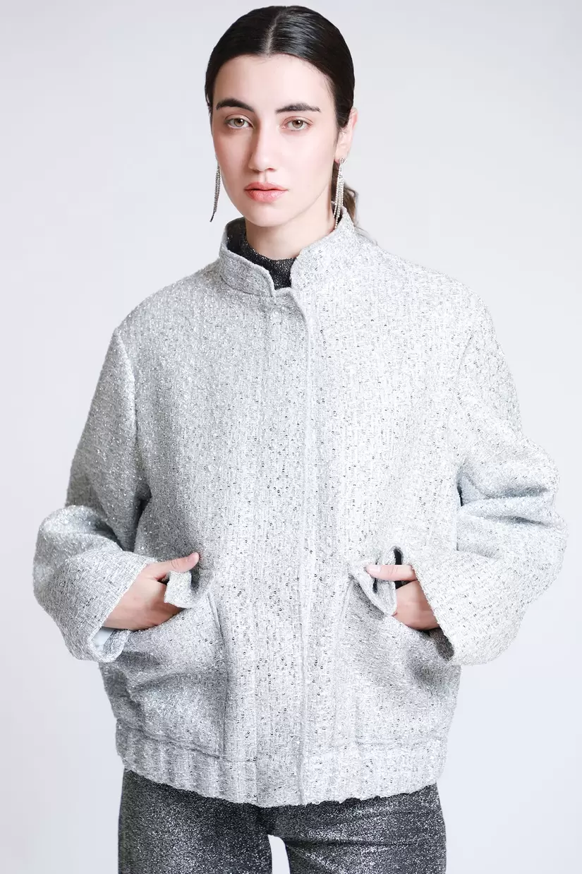 Oferta de Chamarra Boucle Lentejuela por $1199 en LOB