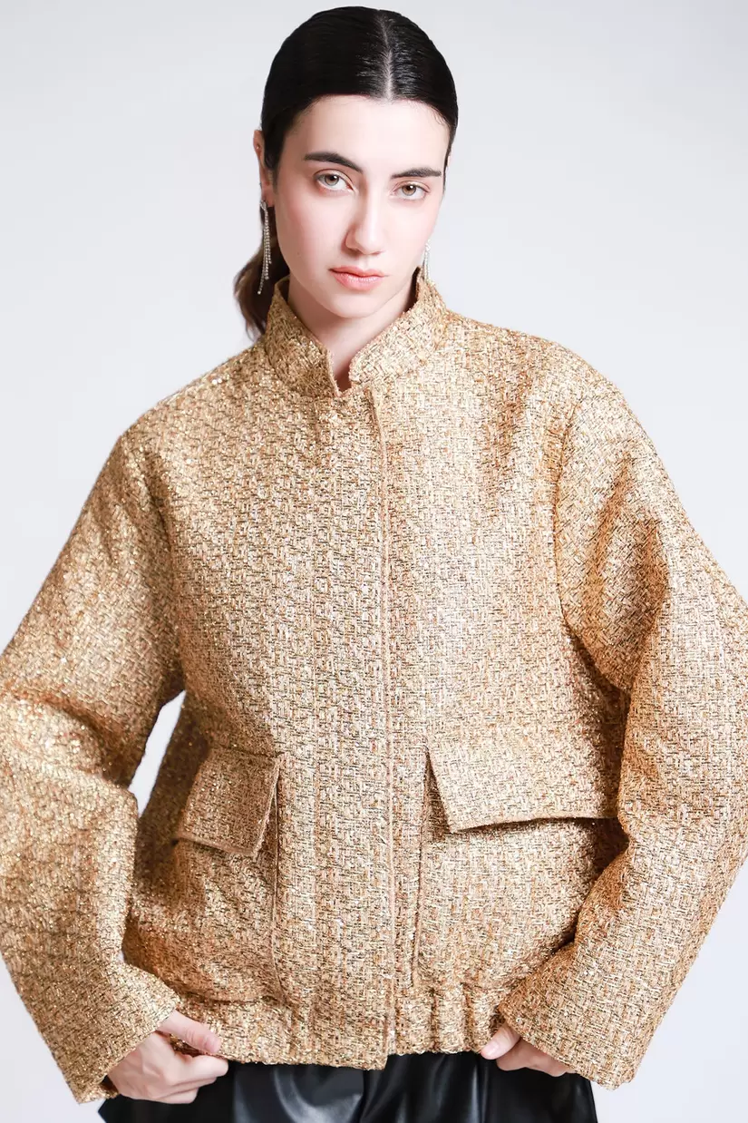 Oferta de Chamarra Boucle Lentejuela por $1199 en LOB