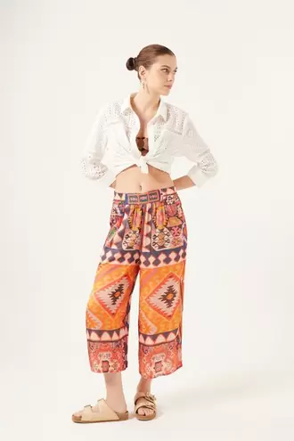 Oferta de Pantalón Rapsodia Mostaza Kilim por $1819.3 en Rapsodia