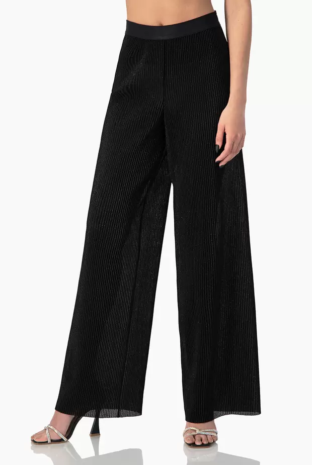 Oferta de Pantalon unicolor de pierna ancha por $559.6 en Ivonne