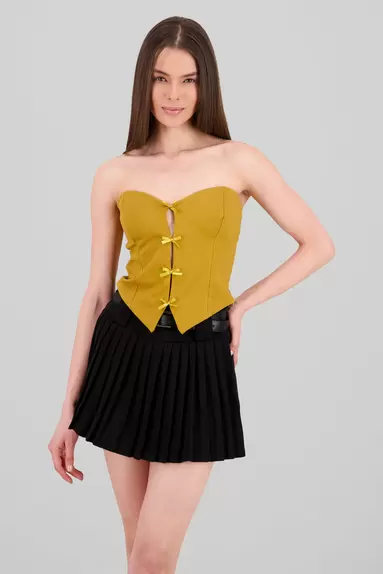 Oferta de Top strapless detalle moños por $169 en Shasa